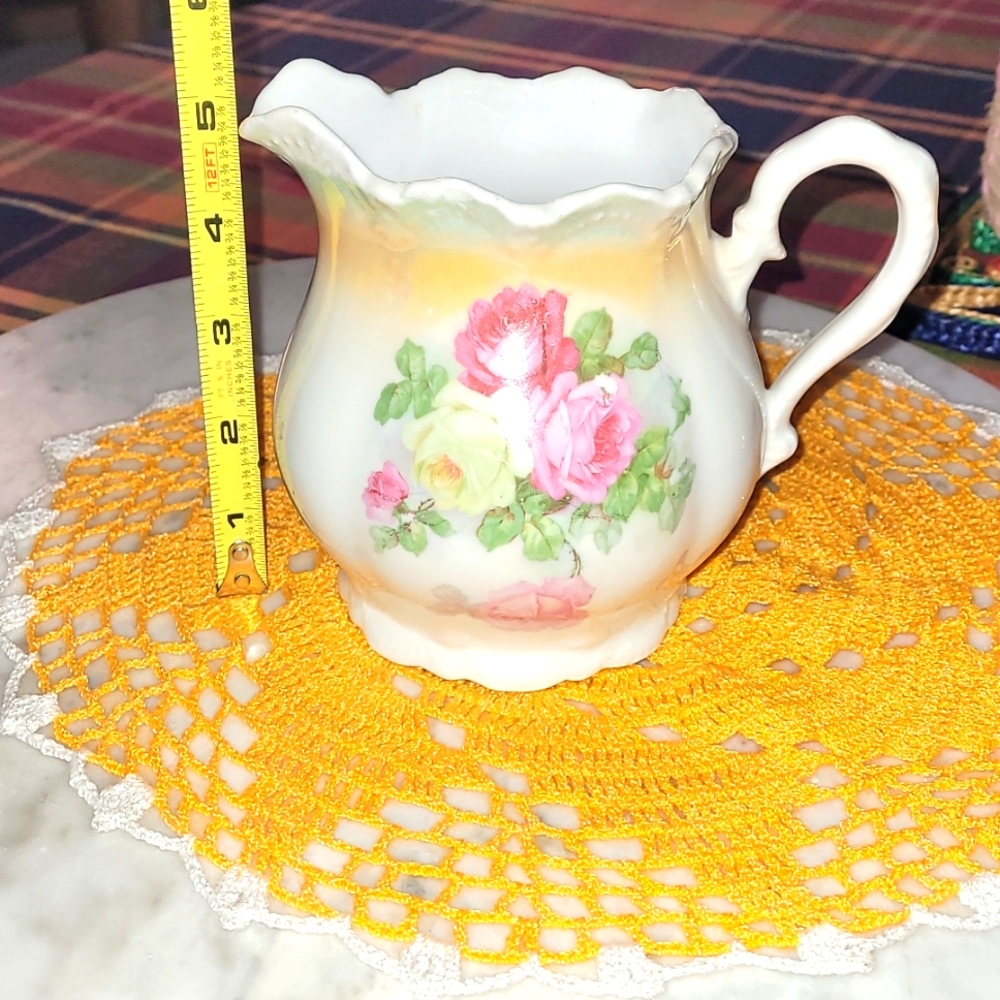 Vintage German creamer pitcher adorned with roses